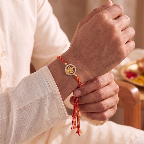 Divine Ganesha Gold-Plated Silver Rakhi ,  hover